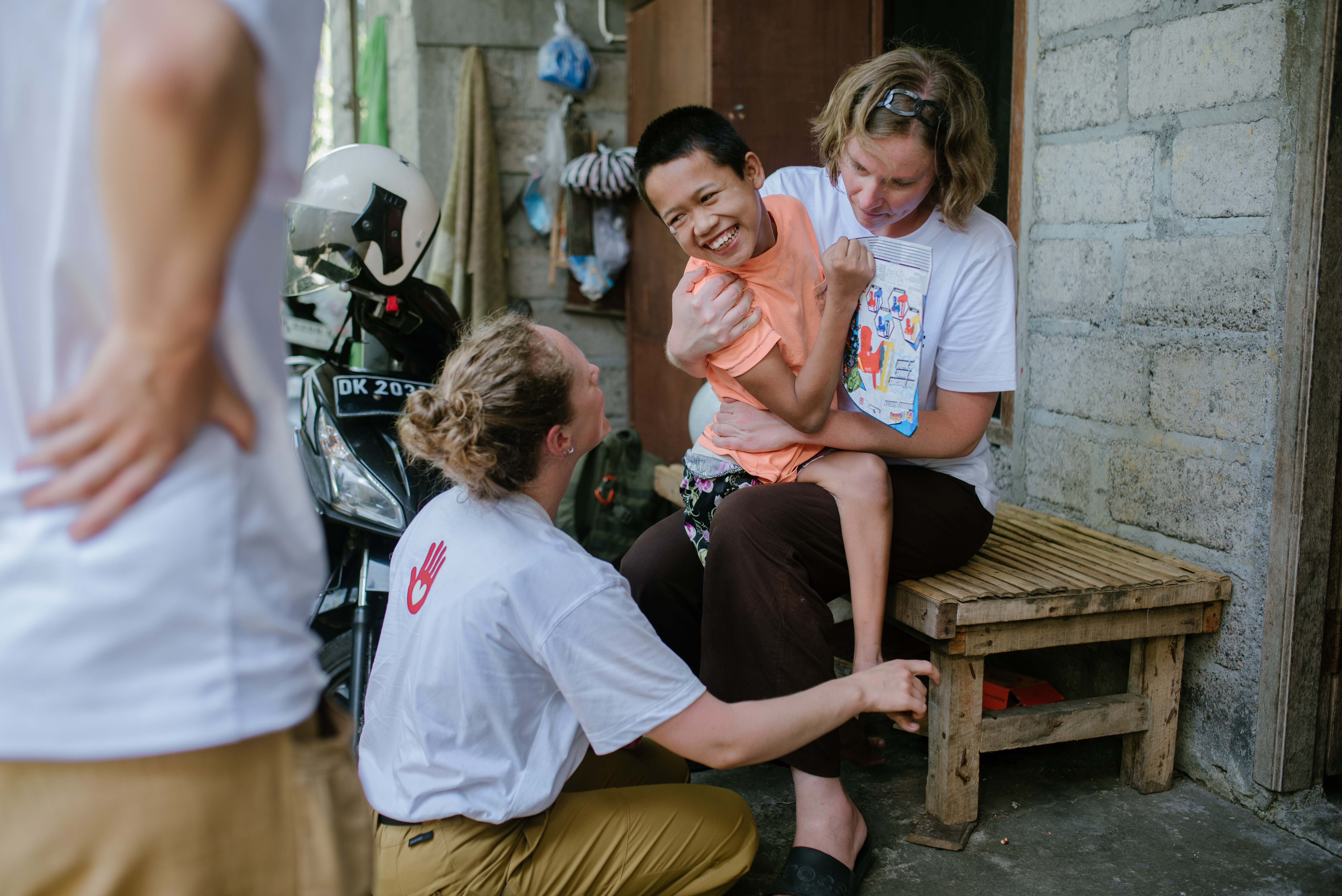 Volunteers caring for child
